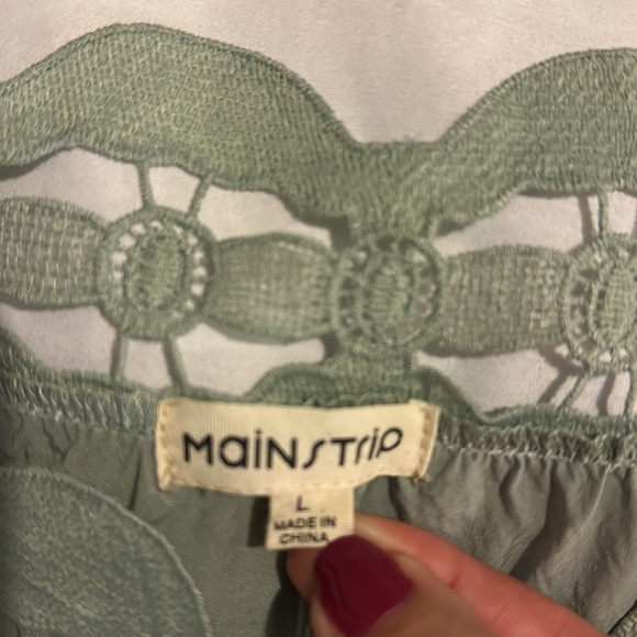 Mainstrip Cutout Blouse - Picture 2 of 4